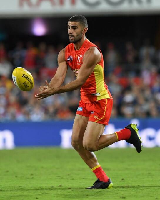 Suns player Adam Saad during the Round 7 AFL match between the Gold Coast Suns and the Geelong Cats at Metricon Stadium in Carrara on the Gold Coast, Saturday, May 6, 2017. (AAP Image/Dave Hunt) NO ARCHIVING, EDITORIAL USE ONLY Adam Saad