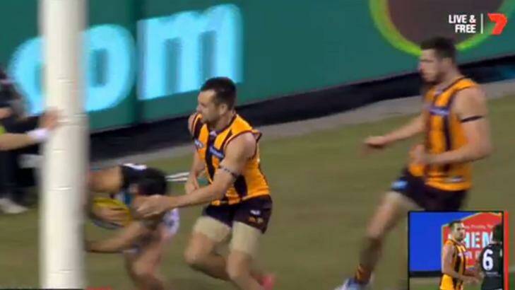 The incident which could cost Hawthorn's Luke Hodge a suspension. Photo: Channel Seven