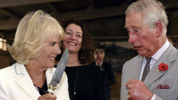 Britain's Prince Charles jokes with his wife Camilla, Duchess of Cornwall during a visit to Seppeltsfield Winery in the Barossa Valley. Photo: Daniel Kalisz