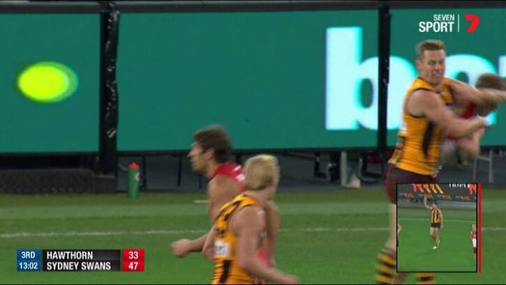 Hawthorn's Sam Mitchell clashes with Sydney's Tom Mitchell. Photo: Channel Seven