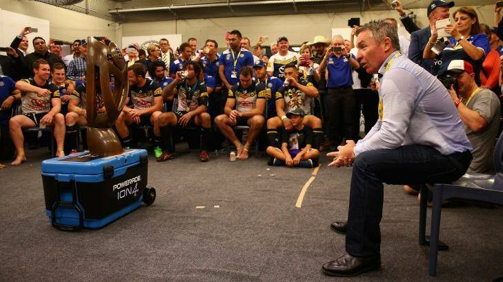 Job done: Cowboys coach Paul Green talks to his players after the grand final. Photo: Cameron Spencer