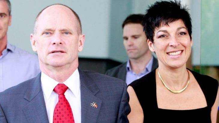 Premier Campbell Newman with wife Lisa attending the funeral of eight children in Cairns a fortnight ago. Photo: Renee Melides