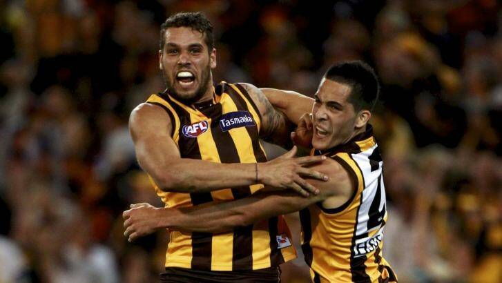 Old times: Shane Savage celebrates a goal with Lance Franklin in 2012. Photo: Paul Rovere