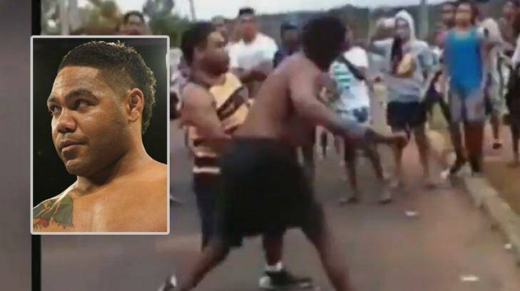 Chris Sandow, left, has been charged over a public brawl in a street. Photo: Nine News/Christopher Pearce