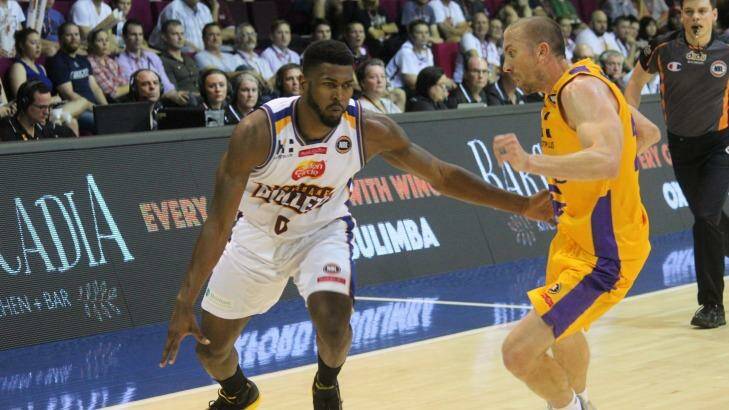 Brisbane guard Jermaine Beal drives past Sydney Kings import Steve Blake at the Convention and Exhibition Centre on Thursday night. Photo: Joshua Paterson
