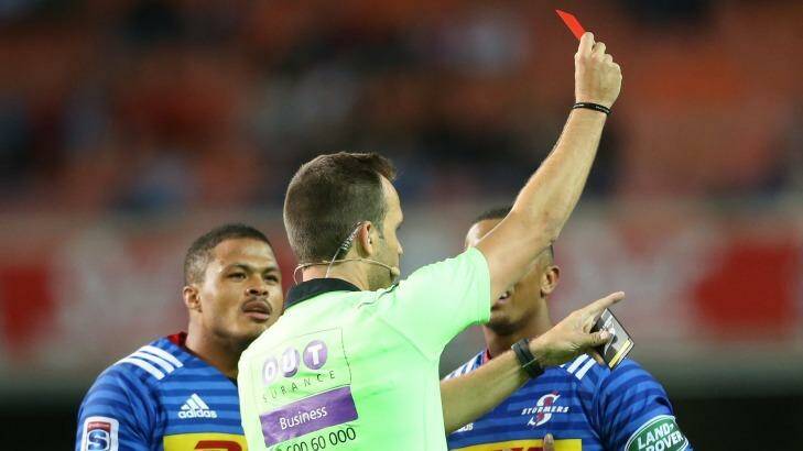 Major moment: Referee Mike Fraser holds the red card to dismiss Stormers winger Leolin Zas. Photo: Gallo Images