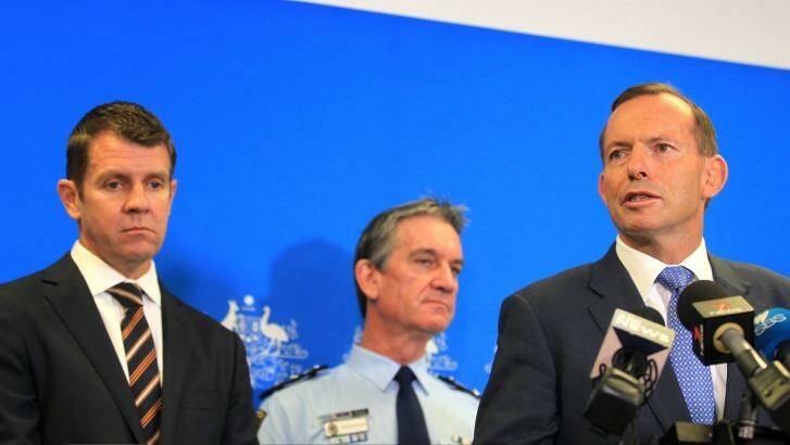 Prime Minister Tony Abbott, right, with NSW Premier Mike Baird and NSW Police Commissioner Andrew Scipione. Photo: James Alcock