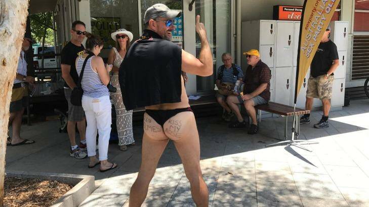 Australian Sex Party Queensland secretary Robin Bristow gets a bit cheeky at a nude beach protest. Photo: Supplied
