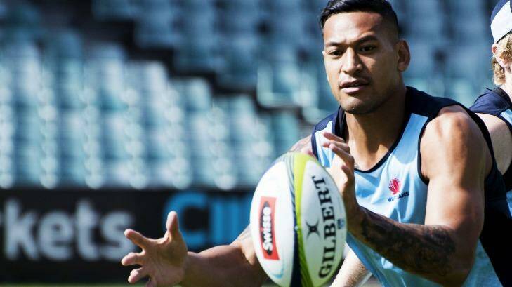 More ball: Israel Folau at training on Friday. Photo: Christopher Pearce