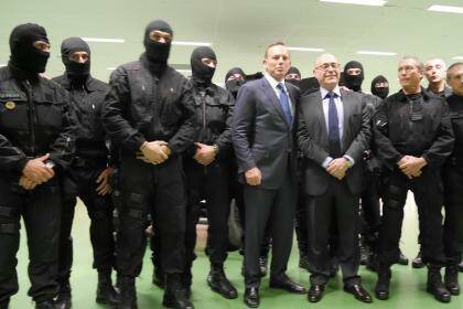 Tony Abbott poses with members of French counter-terrorism unit RAID. Photo: Nick Miller
