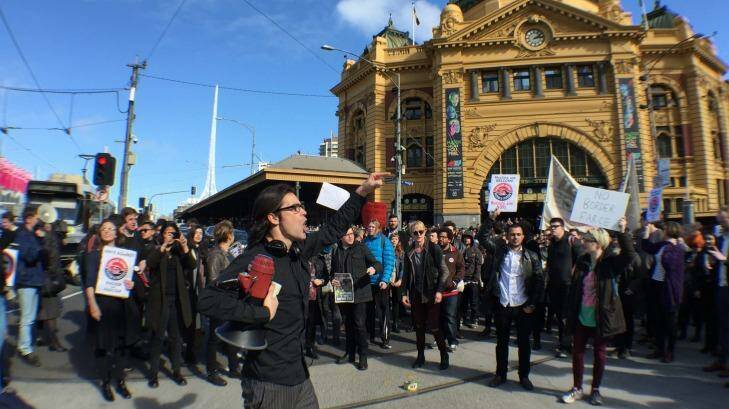 Demonstrators protest against Border Force in Melbourne on Friday afternoon. Photo: Joe Armao