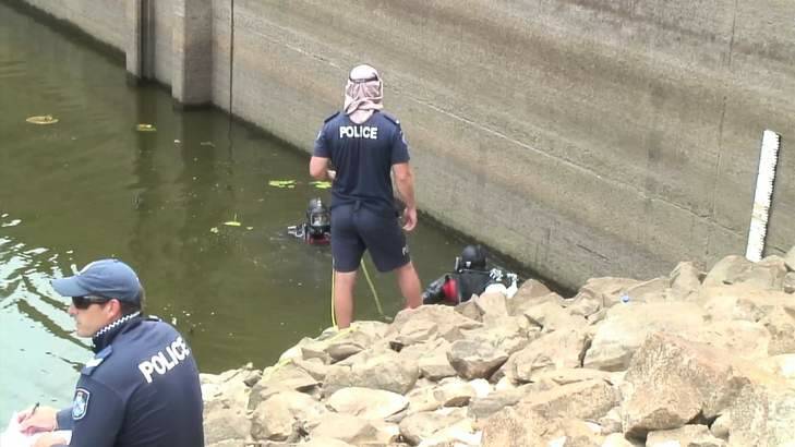 Police divers conduct an earlier search of Cedar Pocket Dam. Photo: Supplied