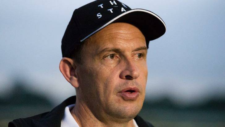 Looking ahead: Chris Waller talks to the media after the trackwork session on February 9. Photo: Janie Barrett