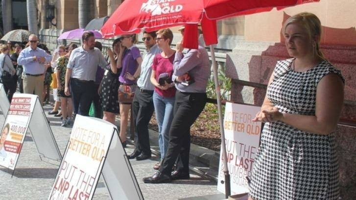 Queensland Council of Unions has repeatedly been asked to remove signage outside a Brisbane pre-polling booth urging voters to put the LNP last.