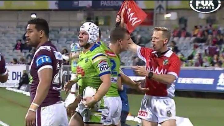 In trouble: Jack Wighton touches touch judge Brett Suttor against Manly on Friday night, and faces a one-week ban. Photo: Fox Sports Screen Grab