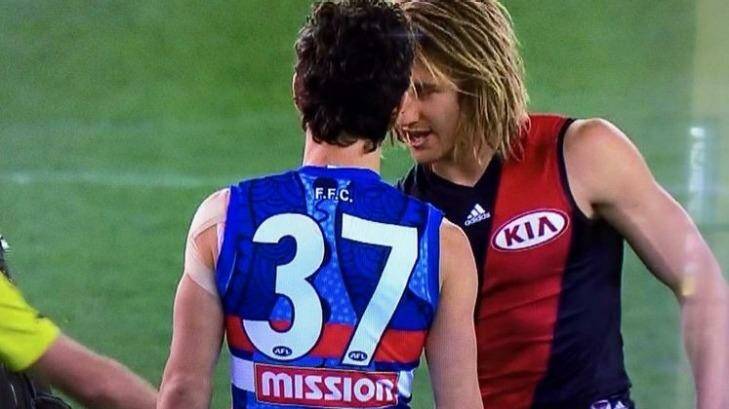 Bob Murphy with Essendon's stand-in skipper Dyson Heppell at the coin toss. Photo: Twitter
