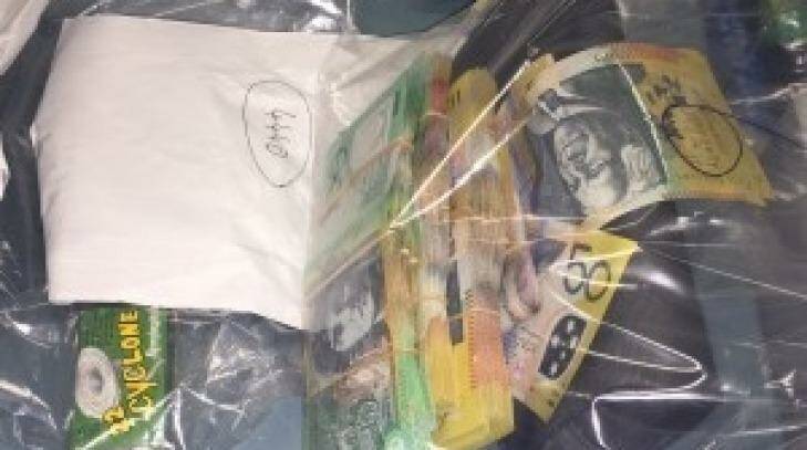 Queensland's anti-bikie police squad seized drugs, weapons, cash and ammo in a raid on the Gold Coast on Sunday.  Photo: Supplied