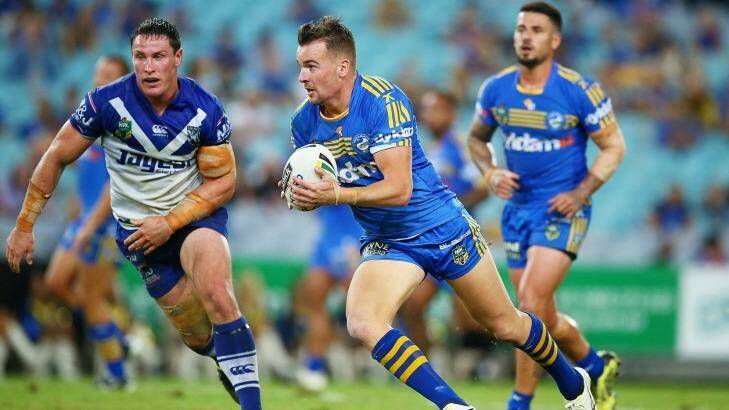 Winging it: Clint Gutherson runs the ball during the round nine NRL match between the Parramatta Eels and the Canterbury Bulldogs at ANZ Stadium. Photo: Mark Nolan