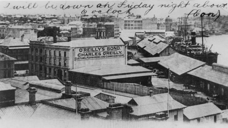 An O'Reilly's advertisement towers over Eagle Street Pier in the early 1900s. Photo: Supplied