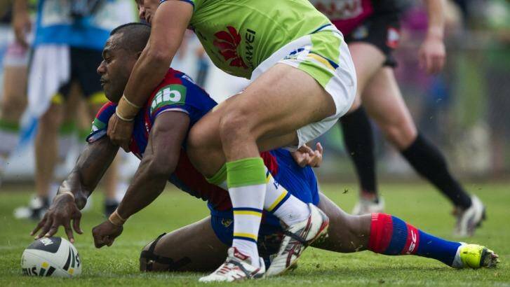 Trial blazer: Newcastle Knights winger Akuila Uate scores a try against Canberra in the pre-season. Photo: Jay Cronan 