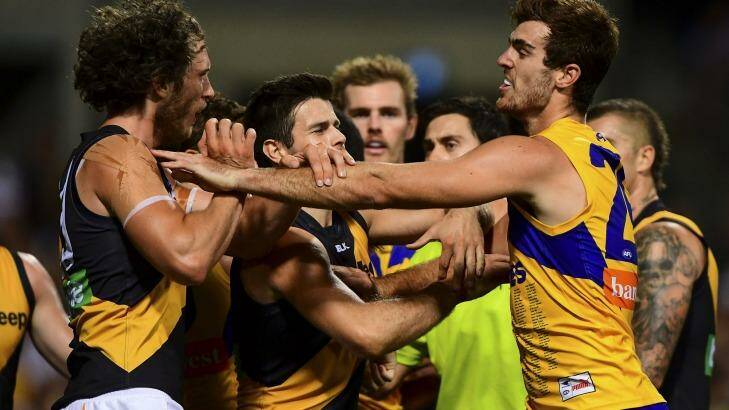 Scott Lycett was wearing the predominantly gold guernsey when he tussled with Tyrone Vickery. Photo: Daniel Carson/AFL Media