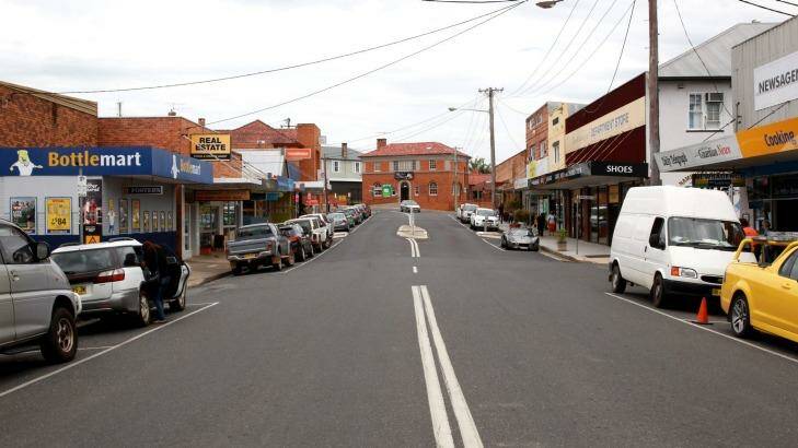 A stiller town: The main street in Macksville was quiet on Tuesday, but will be packed today, with thousands of mourners set to line the thoroughfare for Phillip Hughes’ funeral parade.  Photo: Edwina Pickles