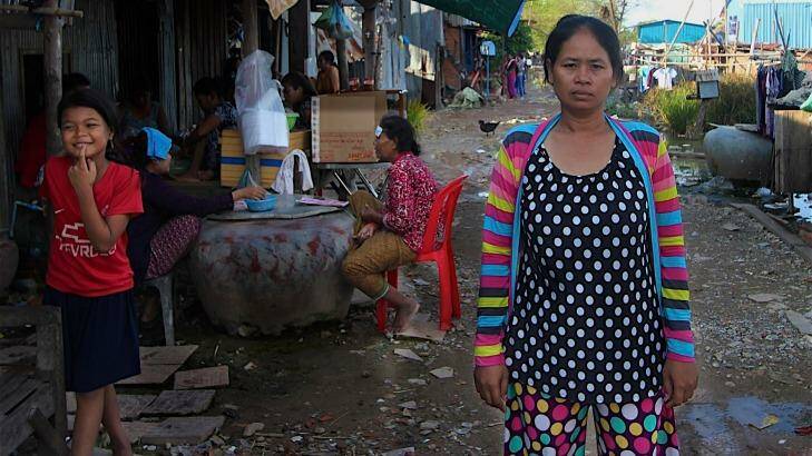In the flood-prone squatter settlement village on the outskirts of the Cambodian capital, Hour Vanny says she was required under a contract to give birth by cesarean section.  Photo: Craig Skehan