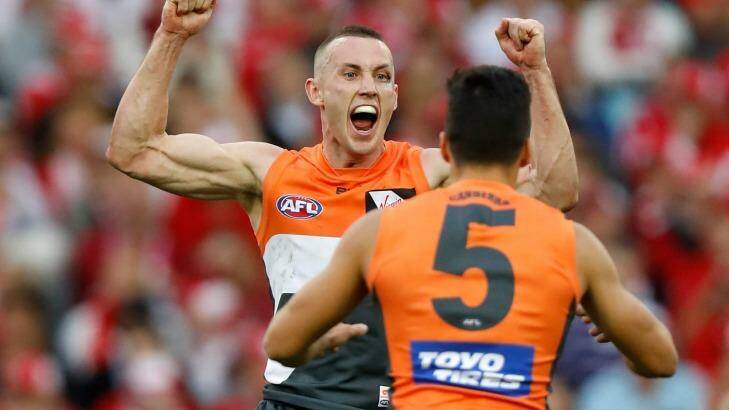 Maiden win: Tom Scully and Dylan Shiel celebrate during the 2016 AFL First Qualifying Final match between the Sydney Swans and the GWS Giants at ANZ Stadium. Photo: Michael Willson/AFL Media
