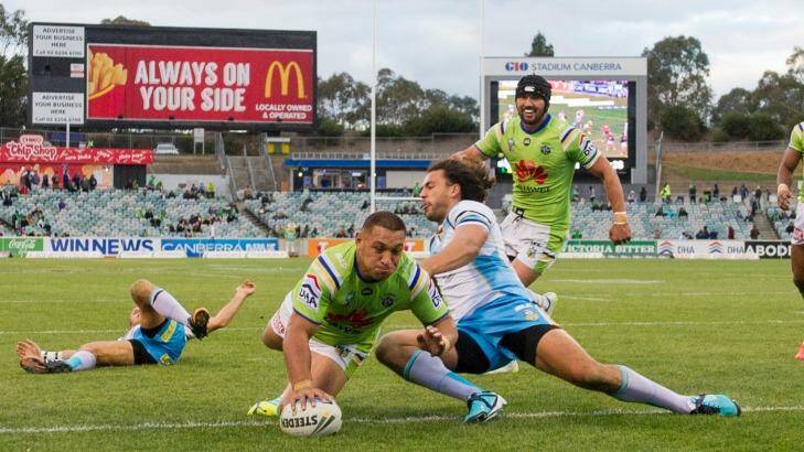  Try time: Josh Papalii scores against the Titans at Canberra Stadium.
 Photo: Jay Cronan