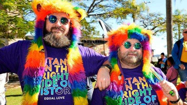 BRISBANE, AUSTRALIA - JUNE 25:  A gay couple show their colours at the Marriage equality rally on June 2  (Photo by Bradley Kanaris/Fairfax Media) Photo: Bradley Kanaris