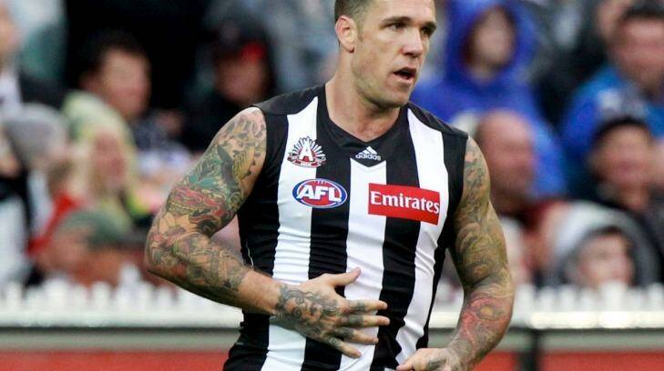 Dane Swan rubs his allegedly expanding stomach on Anzac Day in 2012. Photo: Paul Rovere