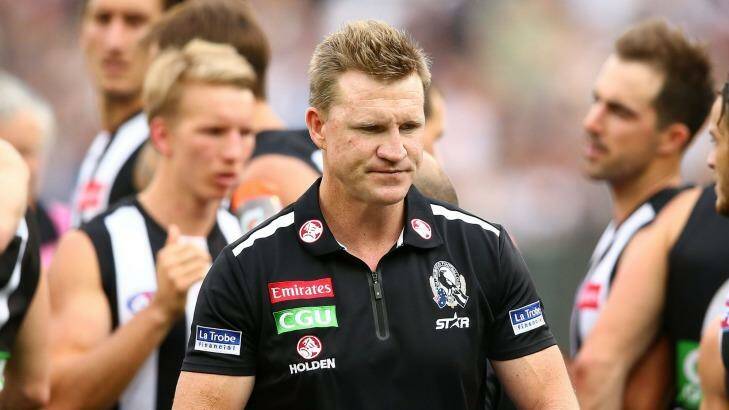 MELBOURNE, AUSTRALIA - MAY 07:  Nathan Buckley, coach of the Magpies speaks to his team during a quarter time break during the round seven AFL match between the Collingwood Magpies and the Carlton Blues at Melbourne Cricket Ground on May 7, 2016 in Melbourne, Australia.  (Photo by Scott Barbour/Getty Images) Photo: Scott Barbour