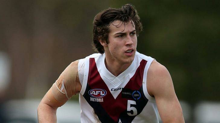 On the move: Andrew McGrath of Sandringham runs with the ball during the TAC Cup. Photo: Jack Thomas/AFL Media