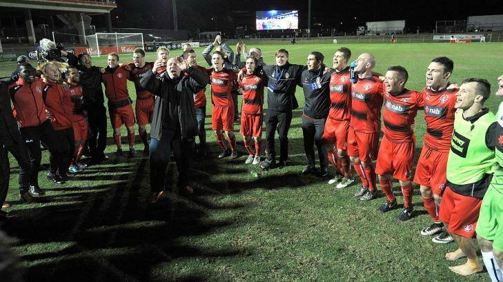 Redlands United celebrate their epic - if unlikely - victory against Adelaide United at Perry Park. Photo: Bradley Kanaris