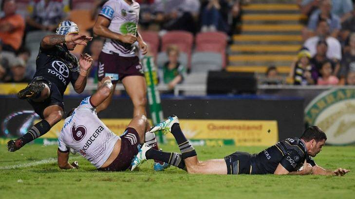 Sliding over: Lachlan Coote scores a try during the round 16 NRL match between the North Queensland Cowboys and the Manly Sea Eagles at 1300SMILES Stadium. Photo: Ian Hitchcock