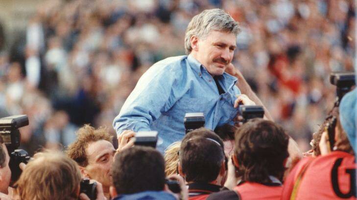 Malthouse is chaired off after West Coast won the flag against Geelong in 1992. Photo: Wayne Ludbey