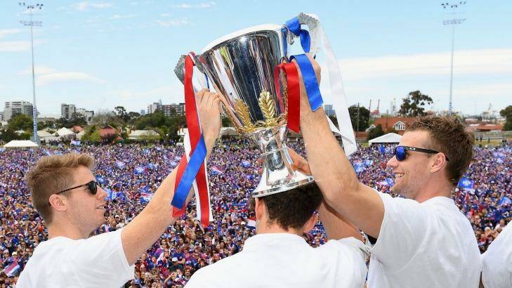 Red, white and blue - fans unite at Whitten Oval after the Bulldog's Grand Final triumph. Photo: Quinn Rooney