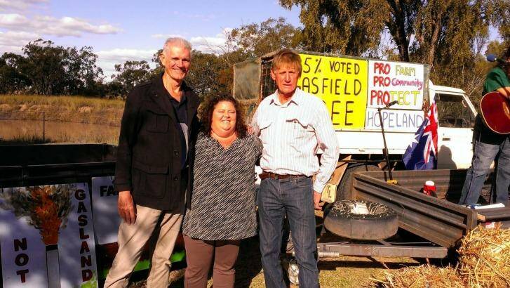 Shay Dougall (centre with Drew Hutton (Lock the Gate) and Hopeland farmer Lee McNicholl. Photo: Supplied