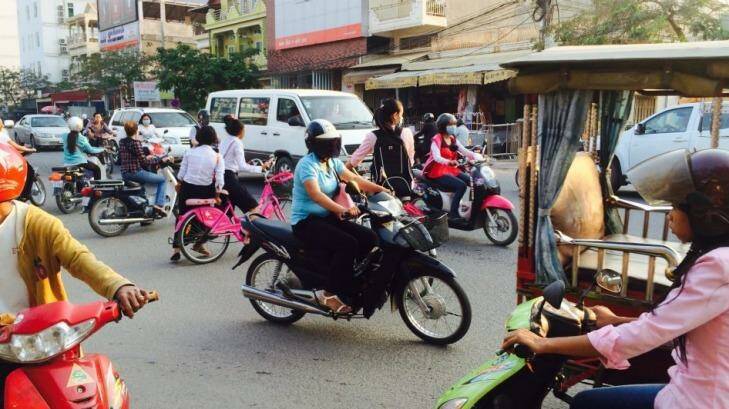 Who dares: Traffic in Phnom Penh Photo: Ross Peake