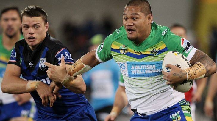 Joseph Leilua of the Raiders is tackled is seized during Canberra's defeat of the Bulldogs on Sunday night.