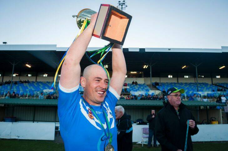 Queanbeyan Kangaroos Vs Queanbeyan Blues Grand Final. Terry Campese holds the trophy with pride after the Blues win the grand final. Photo: Dion Georgopoulos