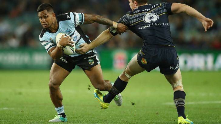 Back on track: Ben Barba steps around the tackle of Michael Morgan on Friday night. Photo: Mark Kolbe