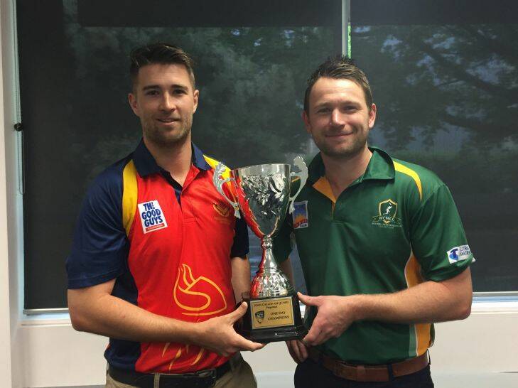 Tuggeranong Valley captain Shane Devoy and Weston Creek Molonglo captain John Rogers with the Cricket ACT Gallop Cup. Photo: Caden Helmers
