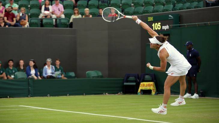 Strong display: Samantha Stosur serves during the first round at Wimbledon. Photo: Tim Ireland