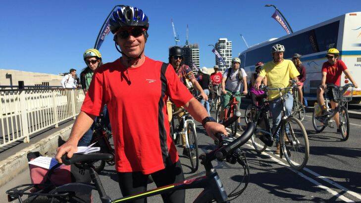 Cyclists protest over plans for a 'green' Victoria Bridge?? connecting?? Brisbane and South Bank.
