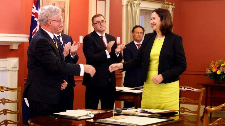 Queensland Premier Annastacia Palaszczuk is sworn in by Governor Paul de Jersey. Photo: Michelle Smith