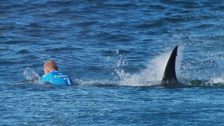 The moment a huge shark launches itself at Australian surfer Mick Fanning.  Photo: World Surf League