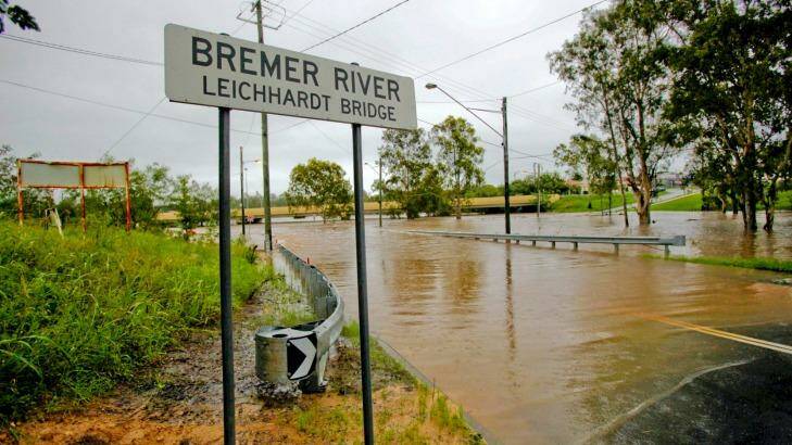 The Bremer River swelling in Ipswich. Photo: Glenn Hunt
