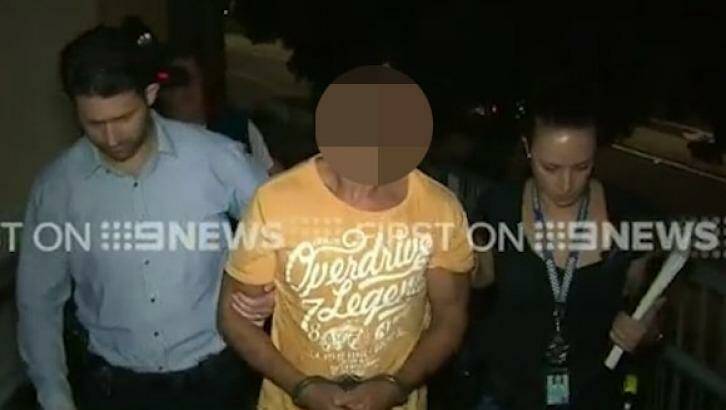Wayne Andrew Hearn, 38, is arrested over the death of?Timothy Lang. Photo: Nine News