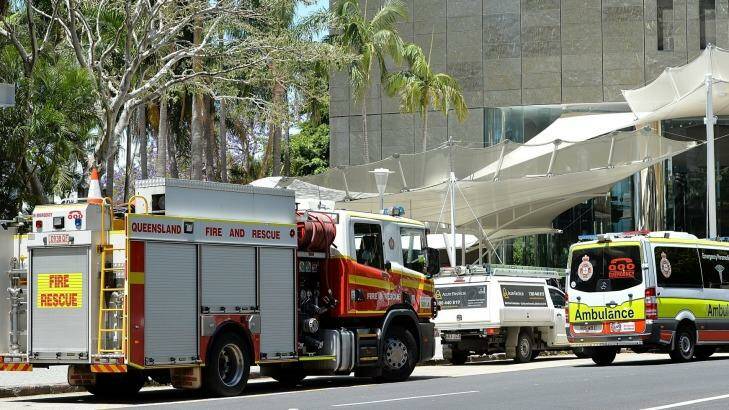 Emergency services are seen attending 1 Eagle Street after the ceiling collapse. Photo: Bradley Kanaris